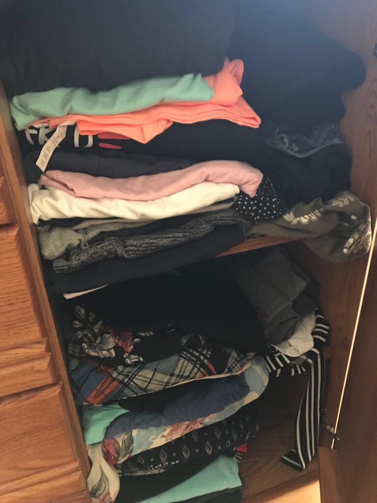 An image of my overstuffed dresser