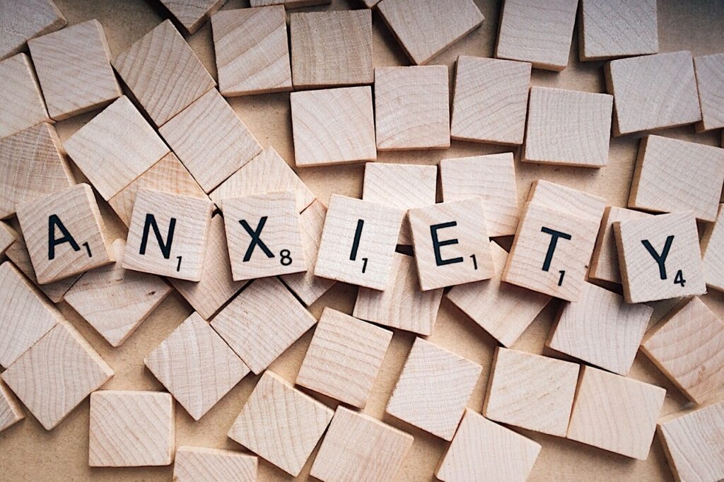 Image of game tiles spelling out the word anxiety